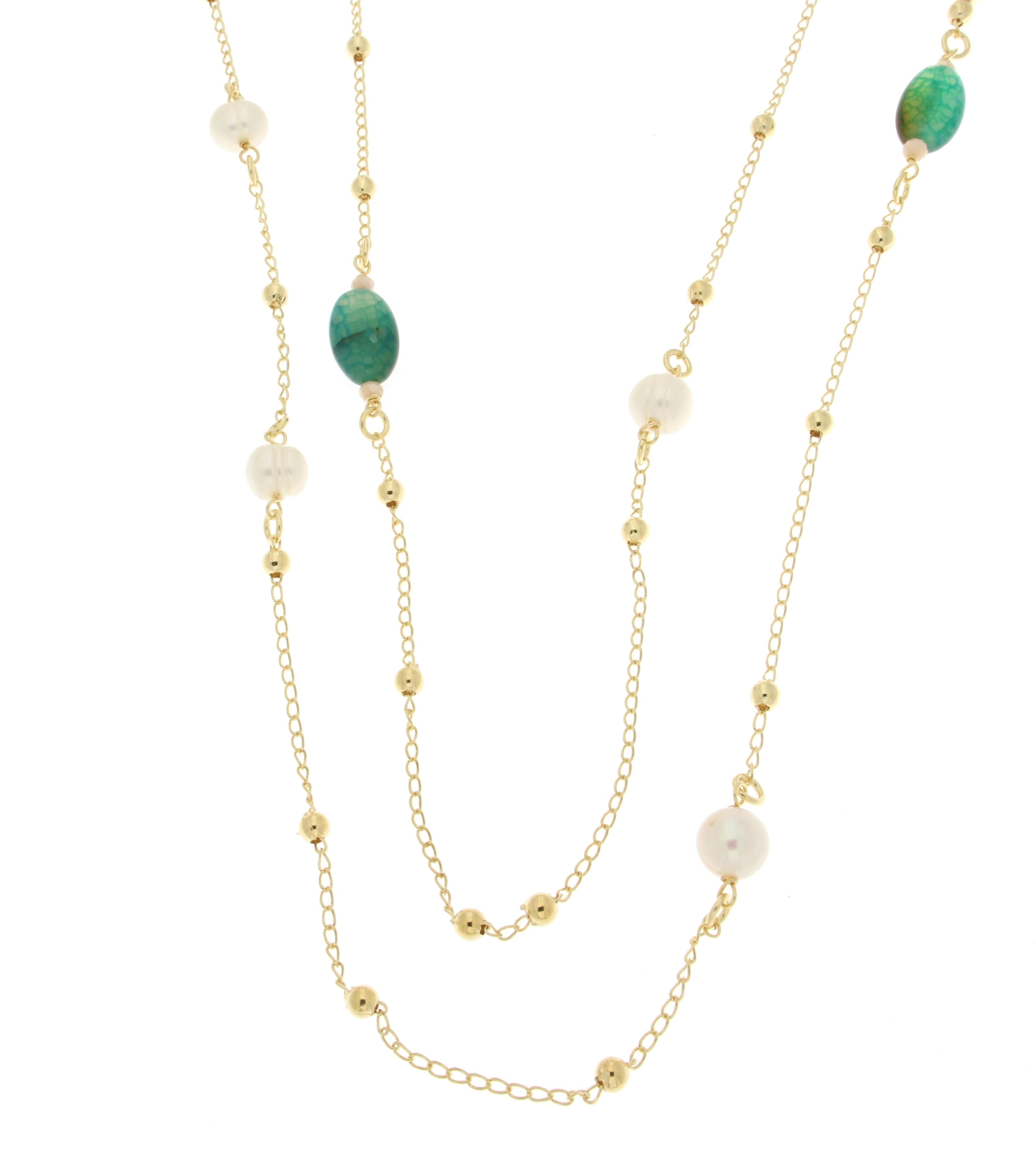 Delicate gold plated necklace with multiple strands featuring small gold beads and larger turquoise and white beads for an elegant layered design.