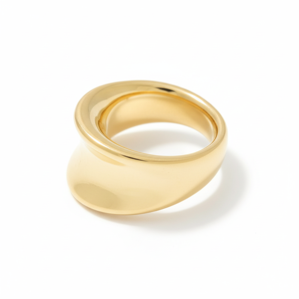 Gold-plated flume concave band ring with a polished finish on a white background