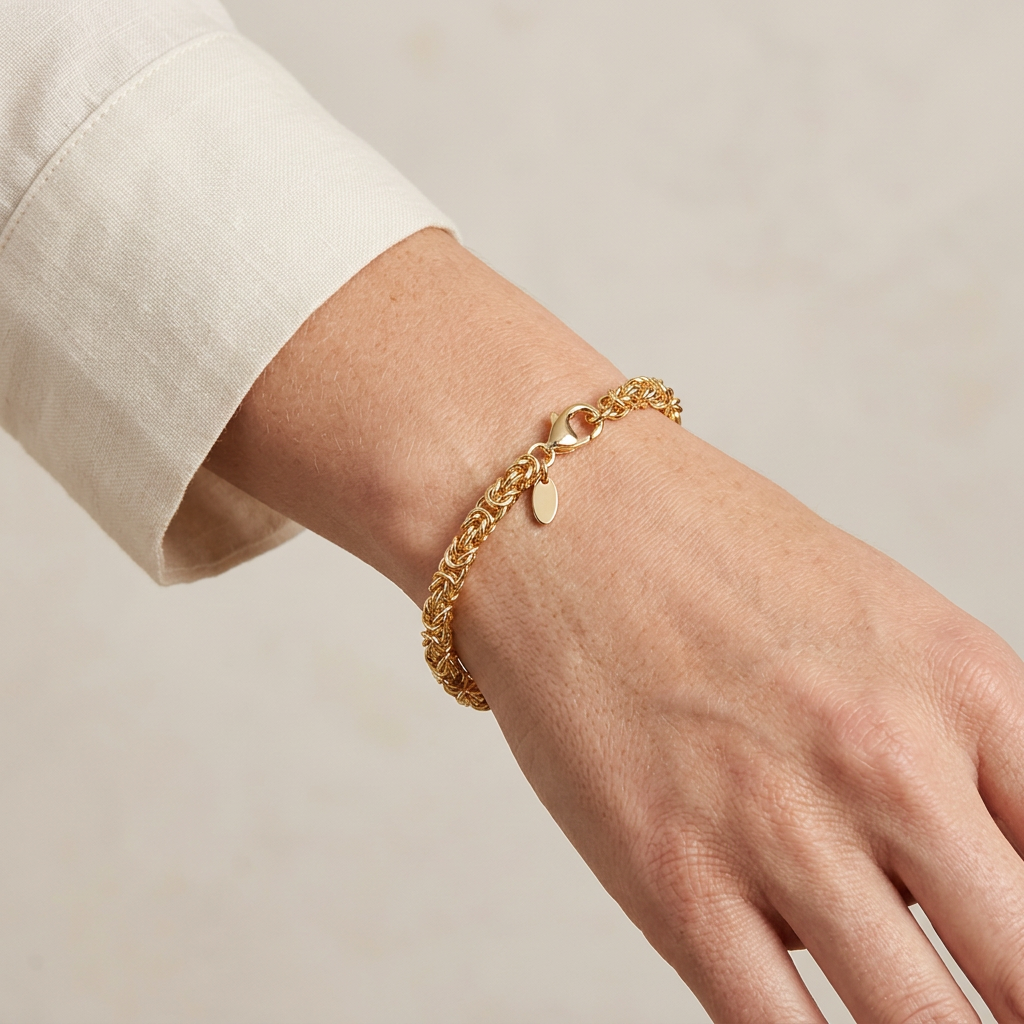 Model wearing the gold bracelet