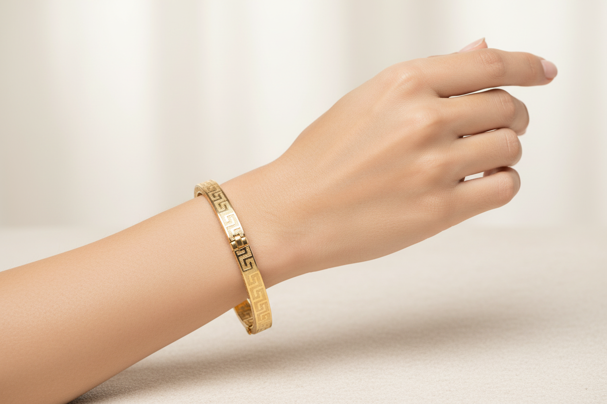 Oval Greek Key Bangle on Model - Side Hinge