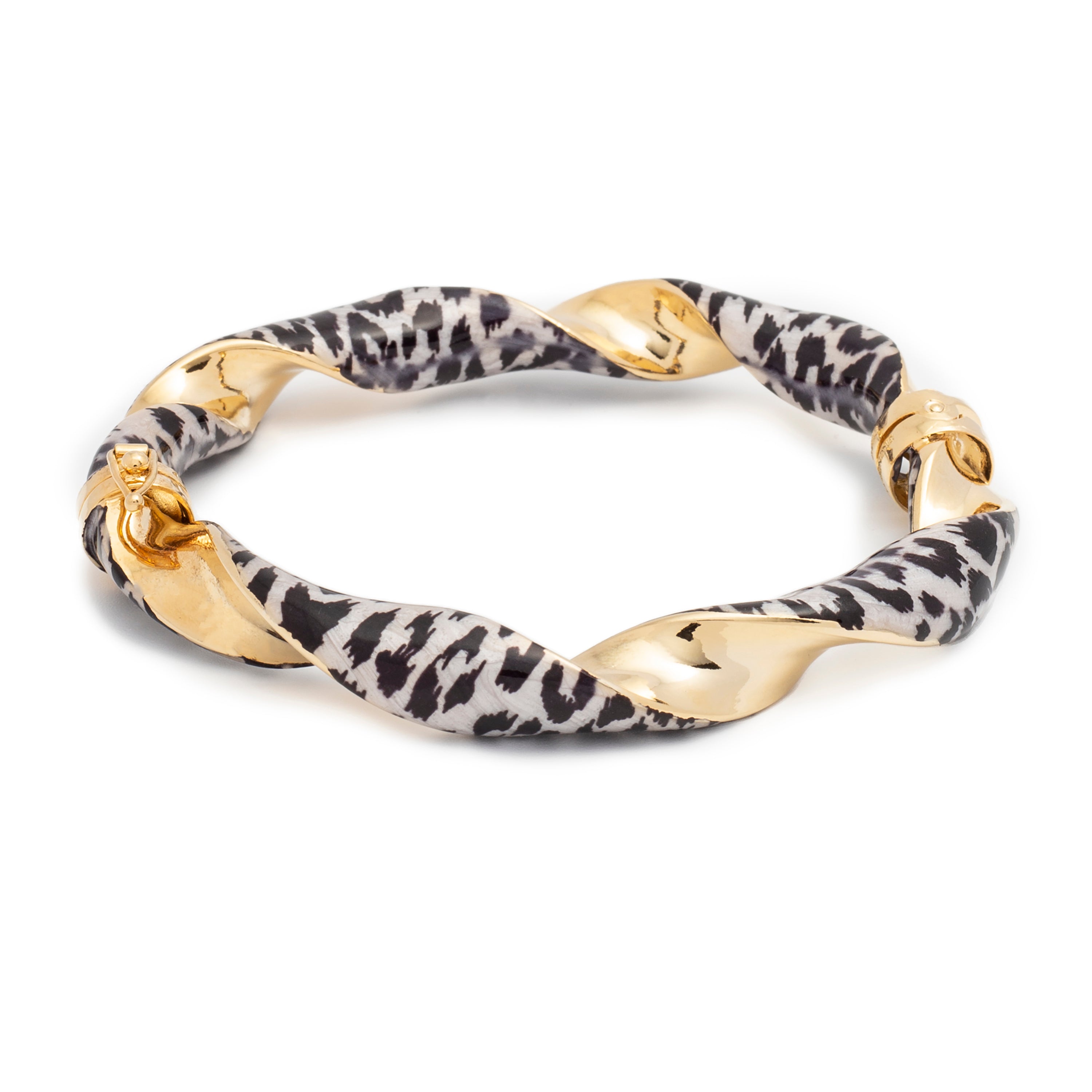 A stylish bracelet featuring a twisted design that combines a shiny gold-tone metal with a black-and-white animal print pattern. The bracelet showcases a unique, eye-catching contrast between the smooth, reflective gold and the textured, patterned material, making it a bold fashion statement.