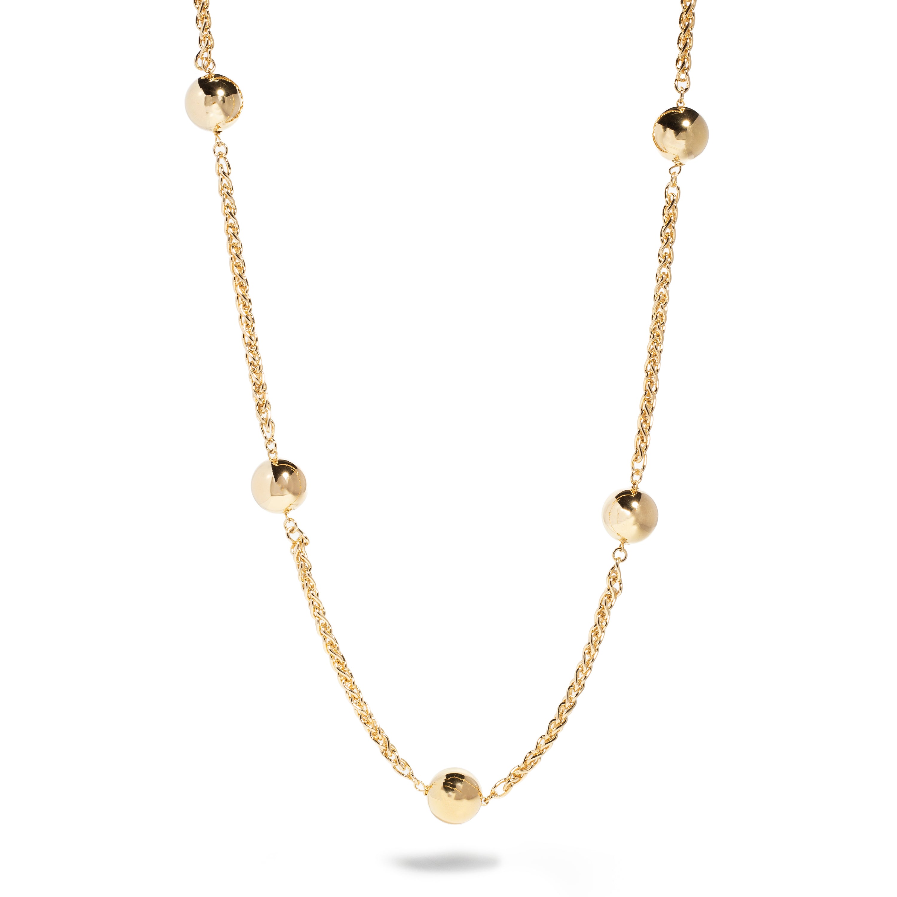 A delicate gold necklace featuring a series of glossy spherical beads spaced evenly along a fine chain. The chain has a subtle twist design, enhancing its elegance. This piece is perfect for adding a touch of sophistication to any outfit.