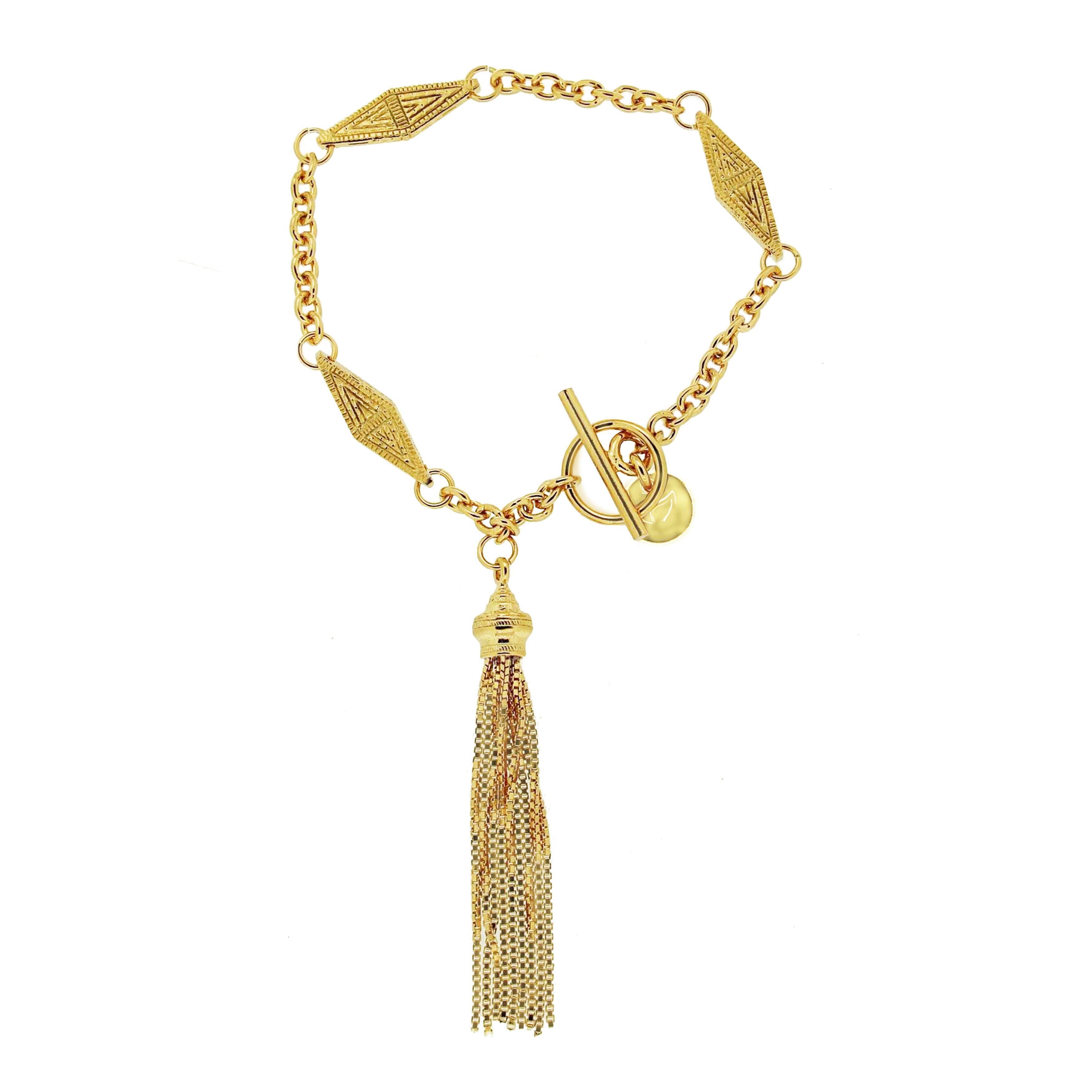 A chic gold bracelet featuring a combination of chain links and decorative elements. The design includes intricately patterned gold accents between the links and a stylish tassel pendant that adds movement and flair. The bracelet closes with a toggle clasp, providing both security and ease of wear. This elegant piece is perfect for adding a touch of sophistication to any outfit.