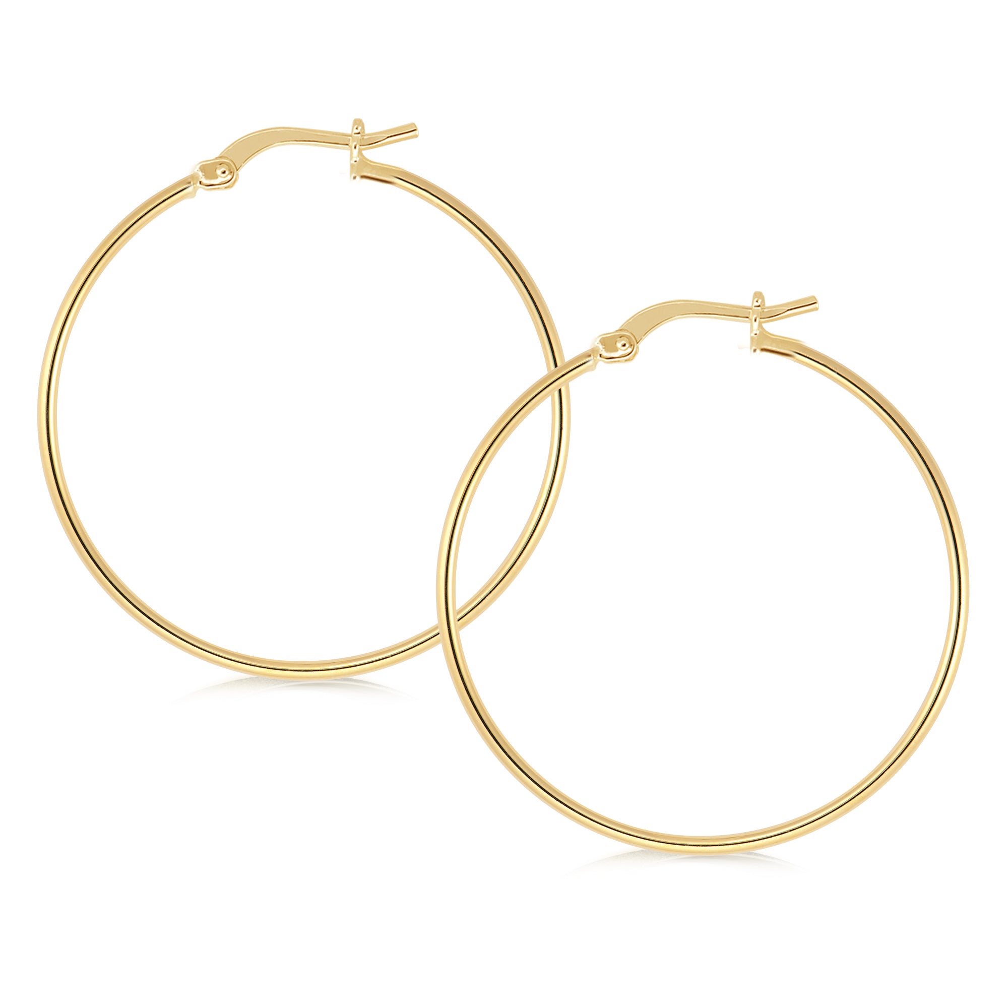 Classic gold hoop earrings featuring a smooth, polished finish. The hoops are lightweight and elegantly designed, with a secure latch closure for easy wear. Their timeless style makes them a versatile accessory suitable for any occasion.