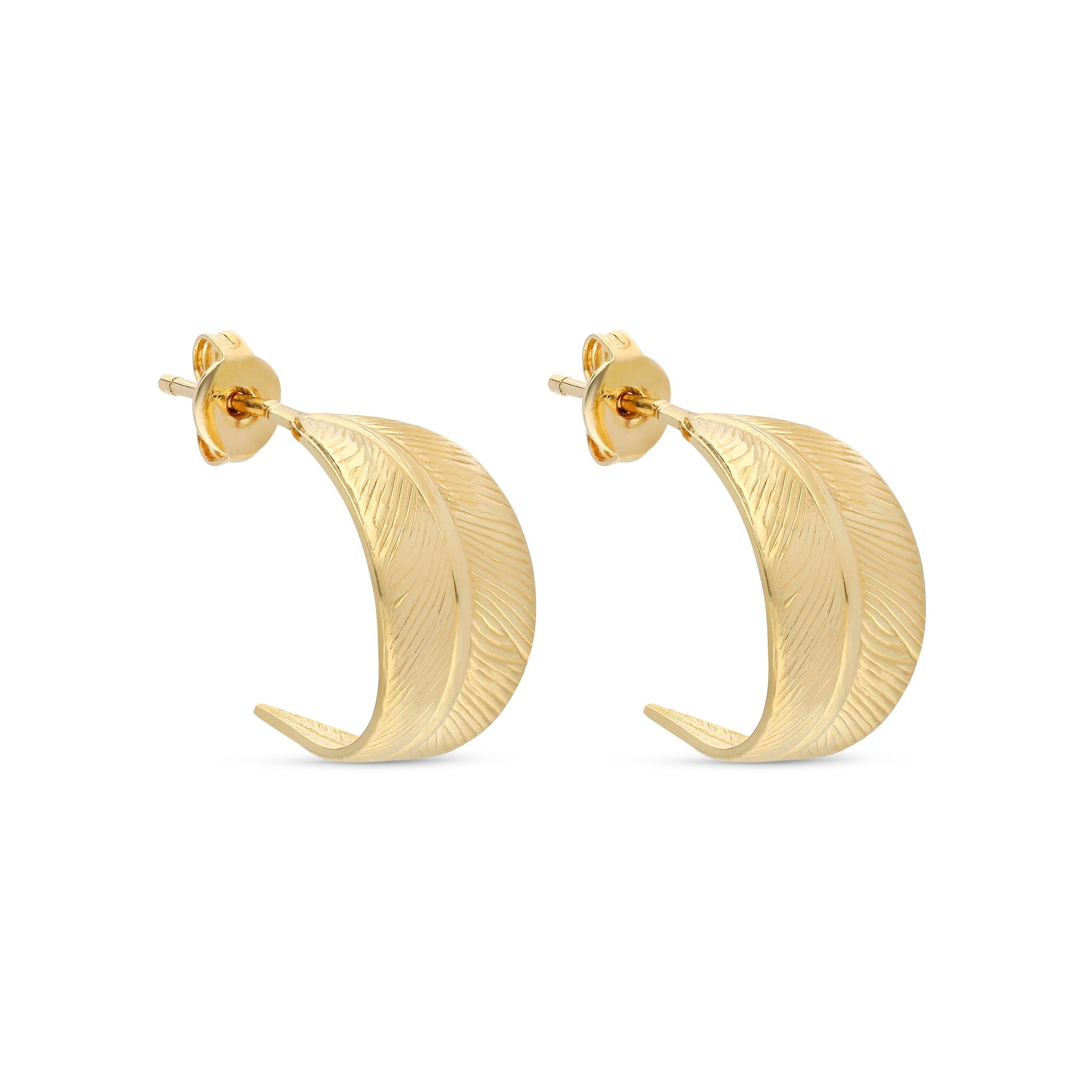 Elegant gold-tone earrings shaped like gently curved leaves. The earrings feature intricate leaf vein engravings, giving them a detailed and organic look. They are designed with a stud backing for a secure fit, making them suitable for both casual and formal occasions.