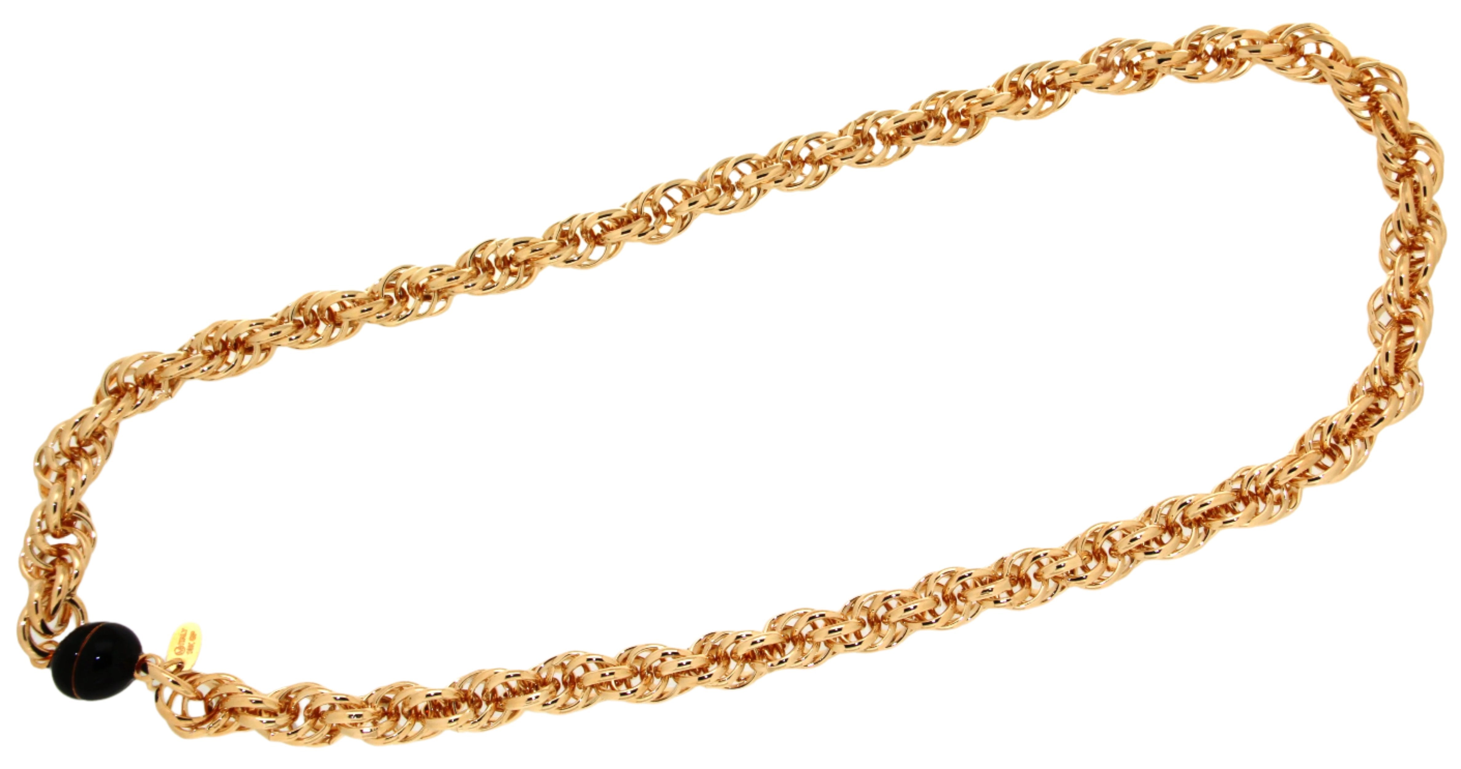 Elegant gold necklace featuring an intricate woven design and a contrasting black bead at the clasp, perfect for making a statement on any occasion.