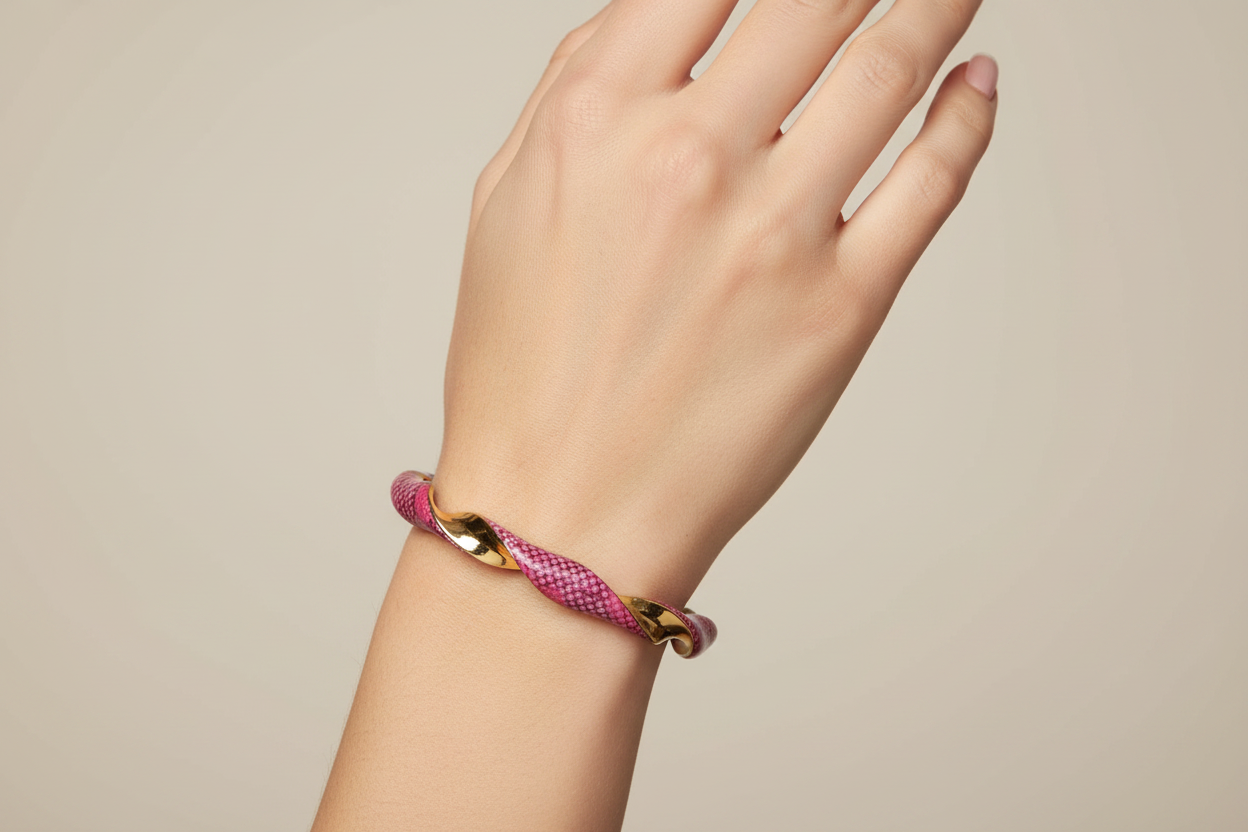 Fuchsia Snakeskin Twisted Gold Bangle on Model Wrist