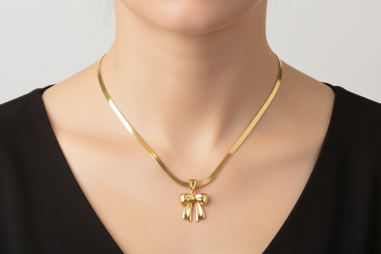 Gold Plated Polished Bow Slider necklace on model