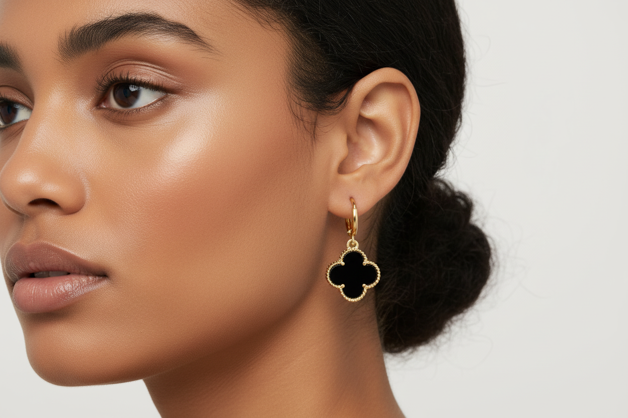 Single Onyx Clover Drop Huggy Earrings on Ethnic Model